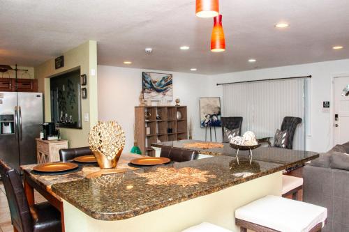 a kitchen and living room with a large counter top at Mint2Stay Suite in Portsmouth