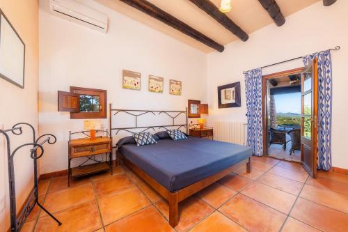 Postel nebo postele na pokoji v ubytování Es Turonet