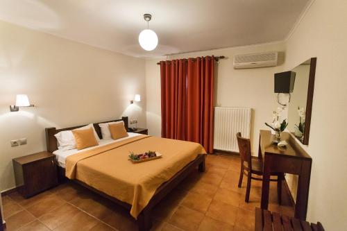 Postel nebo postele na pokoji v ubytování Hotel Morfeas