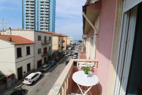 a balcony with a view of a city street at B&B Interno12 in Follonica