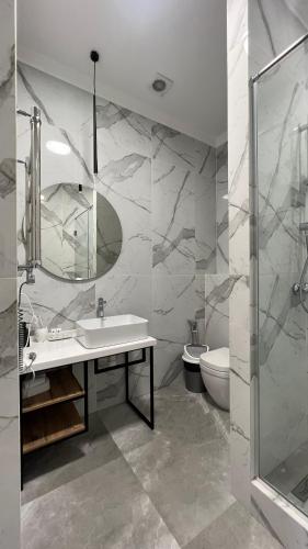 Ένα μπάνιο στο Hotel Manica Esentai City