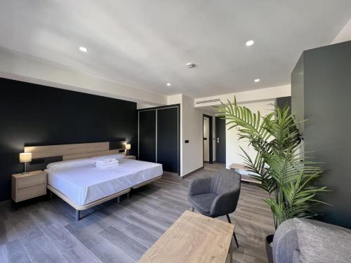 En eller flere senge i et værelse på Leyenda Del Hereje