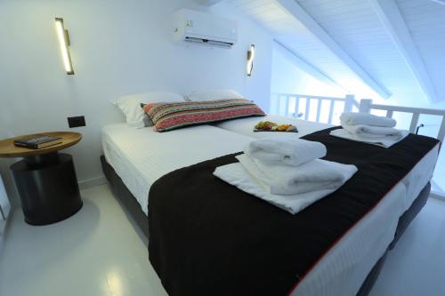 Postel nebo postele na pokoji v ubytování Yianna Hotel