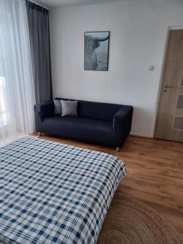Postel nebo postele na pokoji v ubytování Apartmán Radenice