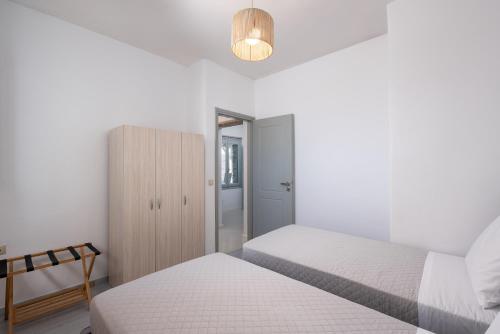 Cama o camas de una habitación en Caval Residences