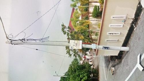 an overhead view of a street light next to a building at Taman Bahagia Homestay in Temerloh