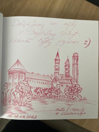 a drawing of a building on a piece of paper at Apartament Centrum II in Lidzbark Warmiński