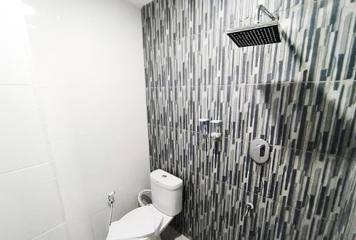 Koupelna v ubytování Hotel Syariah GS Lampung Culture, Bandar Lampung