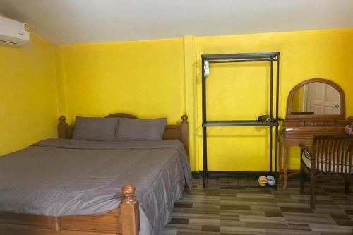 Un ou plusieurs lits dans un hébergement de l'établissement Nokkamin Home Chiang Dao