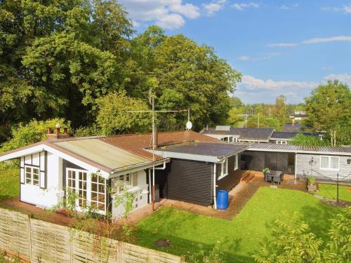 an aerial view of a small house with a yard at 6 person holiday home in Haderslev in Haderslev