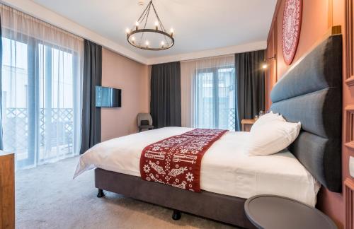 Кровать или кровати в номере Matiane Boutique Hotel