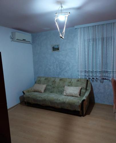 a bedroom with a large bed in a room at Vila Vida in Kruševac