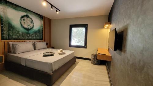 Ένα ή περισσότερα κρεβάτια σε δωμάτιο στο Çimentepe Residence Deluxe 6 - Residence Apartment in Yalikavak