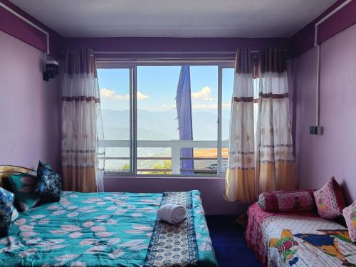 Postel nebo postele na pokoji v ubytování Wonder Hill Parivaar homestay