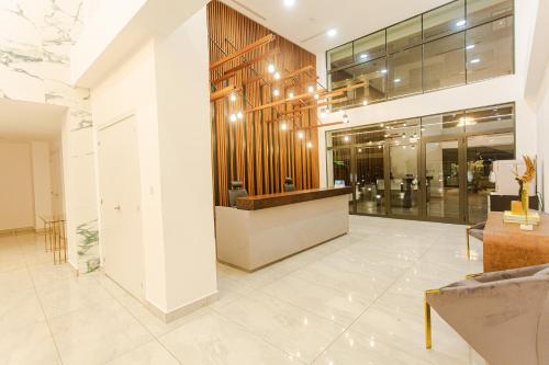 a lobby with a counter in a building at Accra Luxury Apartments @ The Signature in Accra
