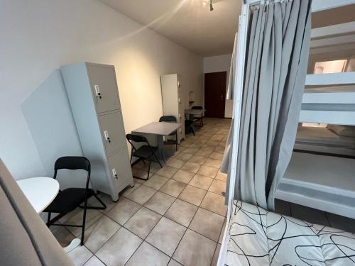Ένα ή περισσότερα κρεβάτια σε δωμάτιο στο Best deal in Neuchâtel city center