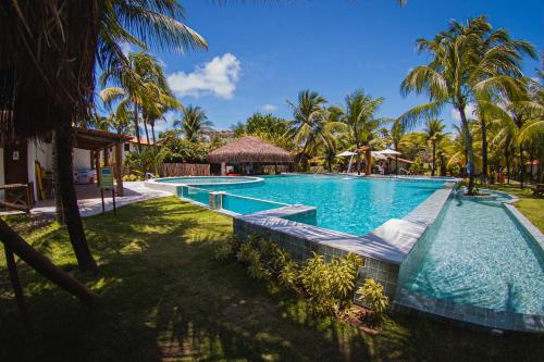 A piscina localizada em Pousada Privê Pontal de Maracaípe ou nos arredores