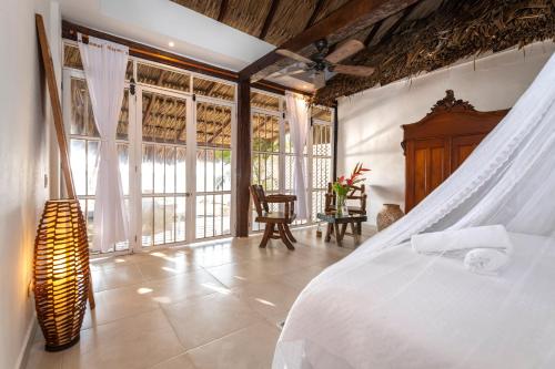 Postel nebo postele na pokoji v ubytování Hotel Coralina Island