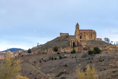an old building on top of a hill at ETH Rioja in Haro