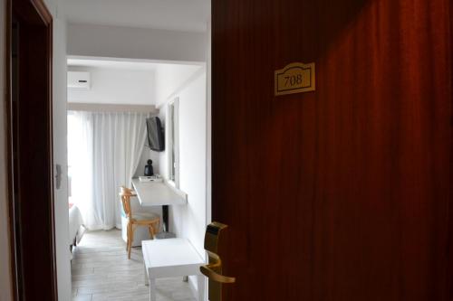 TV a/nebo společenská místnost v ubytování Gran Hotel Fontainebleau