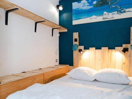 Giường trong phòng chung tại Appartement Narbonne-Narbonne Plage-Narbonne Plage, 2 pièces, 2 personnes - FR-1-409-25