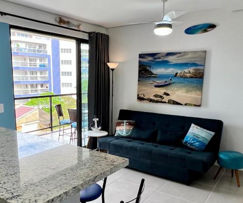 Posezení v ubytování Apto novo com AC 1 quadra da praia Guaratuba PR