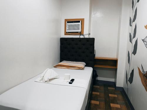 Ein Bett oder Betten in einem Zimmer der Unterkunft FB DORMITEL SUITES