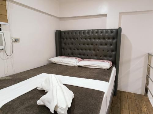 Ein Bett oder Betten in einem Zimmer der Unterkunft FB DORMITEL SUITES