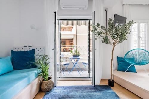 Ένα ή περισσότερα κρεβάτια σε δωμάτιο στο Felicity Blue-Thessaloniki Center Superior Apartment