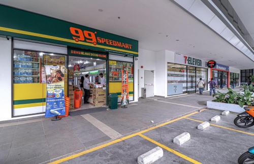 a store front of a shopping center with a store at 10 min to My town family unit By Nexx Field in Kuala Lumpur
