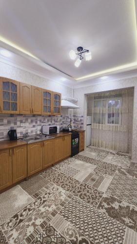 Cuina o zona de cuina de APARTMENT «СЕМЬЯ»