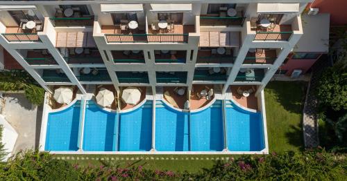 an aerial view of a hotel with a swimming pool at Hydramis Palace Beach Resort in Georgioupolis