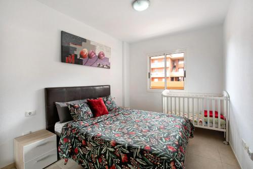 Postel nebo postele na pokoji v ubytování Beach Front Apartment Puertito