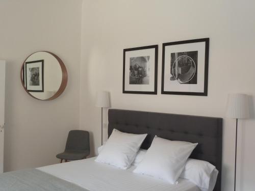 Katil atau katil-katil dalam bilik di Appartement Quartier Mazarin