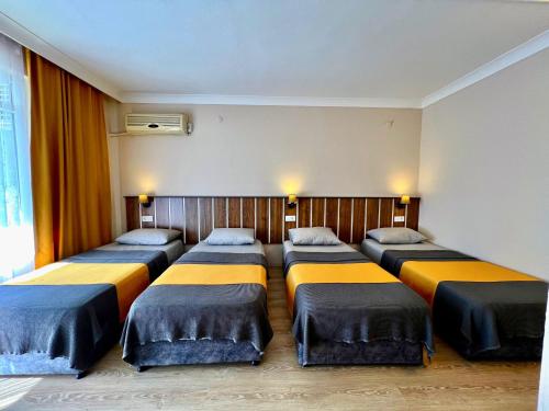 Postel nebo postele na pokoji v ubytování Cord Hotel & Resort