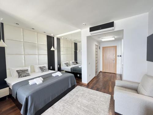 Ένα ή περισσότερα κρεβάτια σε δωμάτιο στο View studio 50 meters from the sea, Porta Batumi Tower