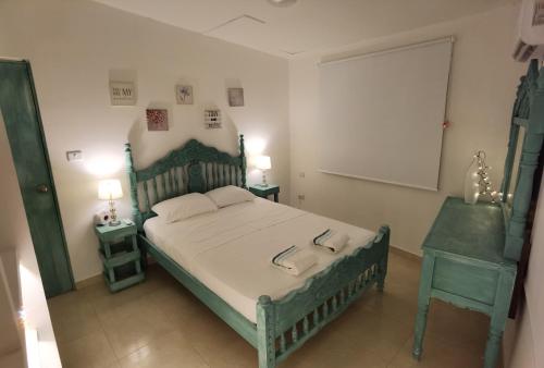 Letto o letti in una camera di Apartahotel Santori Cartagena