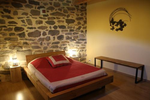 Postel nebo postele na pokoji v ubytování Gîte des Cabr'éoles