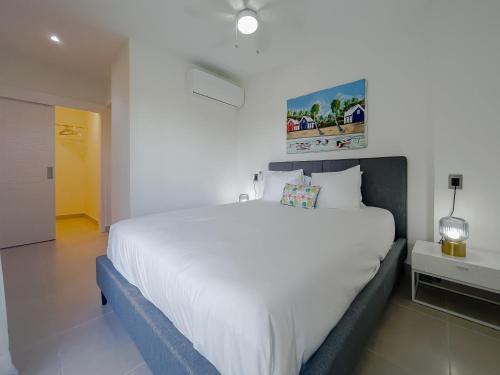 Postel nebo postele na pokoji v ubytování Space and comfort for your beach vacation