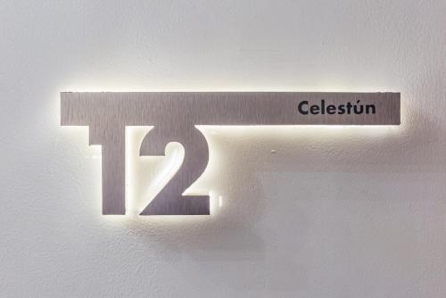 a sign with the number on a wall at Casa Castillo in Mexico City