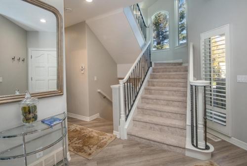 a staircase in a home with a mirror at Castle Peak Close in Edwards