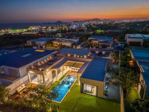 an aerial view of a house with a swimming pool at Casa Herradura - Ocean View Luxury Villa in Cabo San Lucas