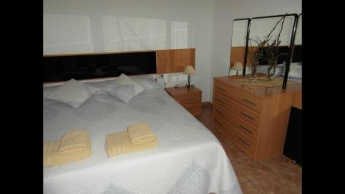 Katil atau katil-katil dalam bilik di Ca n'Antonia Mestre