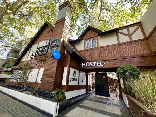 a building with a sign that reads hostel at Gorilla Hostel in Mendoza