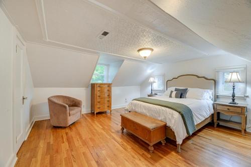 a bedroom with a bed and a chair at Cozy Grants Pass Home about 9 Mi to Rogue River Access in Grants Pass