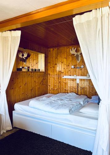 Giường trong phòng chung tại Felsenberg - CharmingStay
