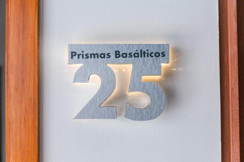 a glass door with a sign that reads at Casa Castillo in Mexico City