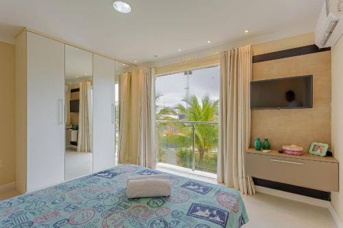 A bed or beds in a room at GB15 Excelente Casa 5 Quartos a 300m da Praia
