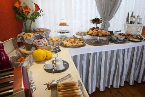 a buffet with many different types of food on a table at B&B Il Parco in Monterosso al Mare