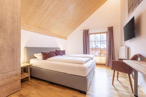 Postel nebo postele na pokoji v ubytování Chalet Fanningberg